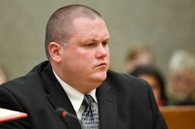 Ex-Minneapolis cop Christopher Reiter listened as his defense attorney Robert Fowler asked Judge Fred Karasov for a lighter sentence for his client. ]