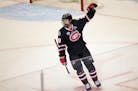 St. Cloud State forward Nolan Walker celebrated after scoring the game-winning goal with under a minute to play in regulation on Thursday.