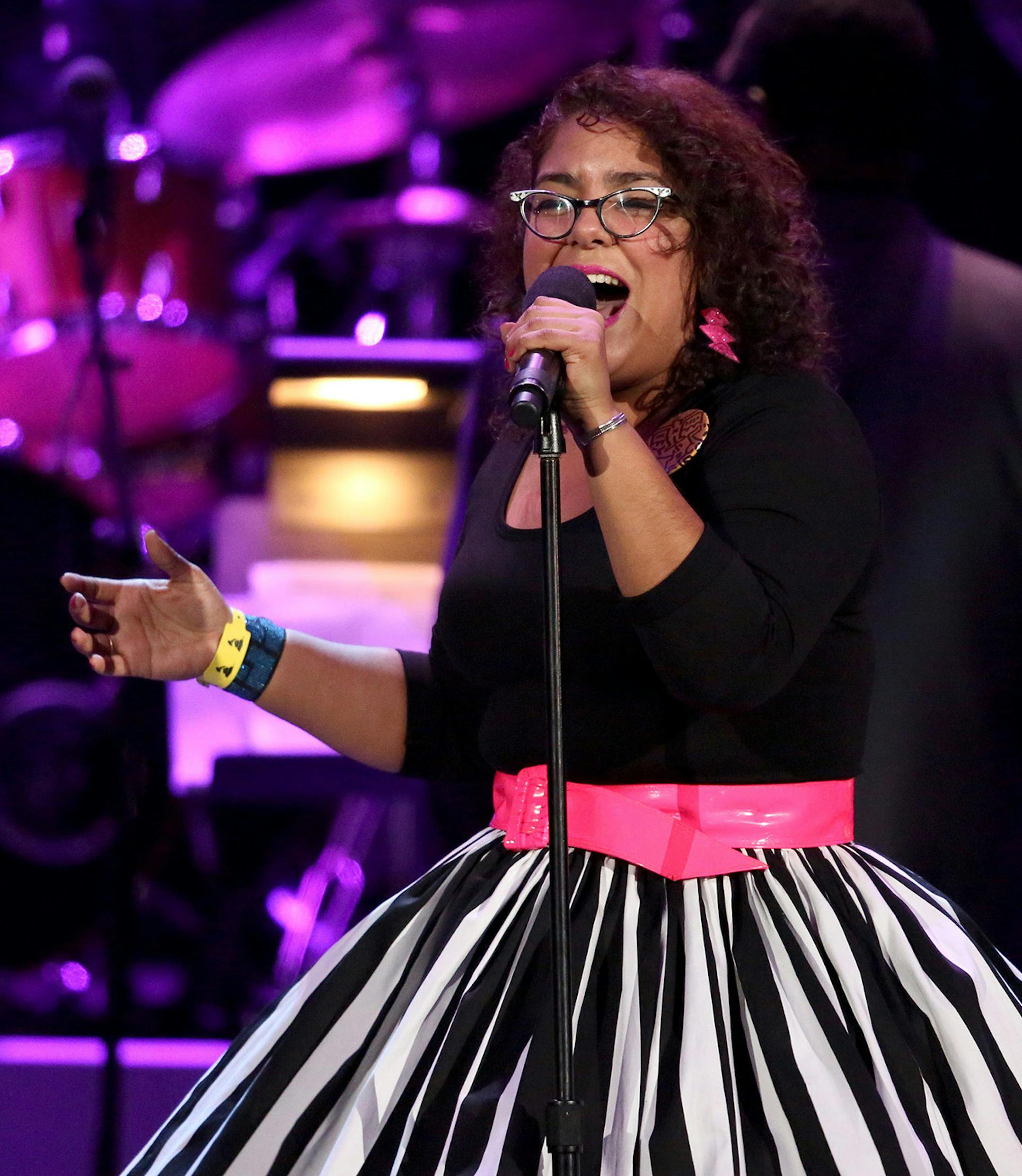 La Marisoul of La Santa Cecilia performs at the pre-telecast of the 56th annual GRAMMY Awards on Sunday, Jan. 26, 2014, in Los Angeles. (Photo by Matt Sayles/Invision/AP) ORG XMIT: INVW