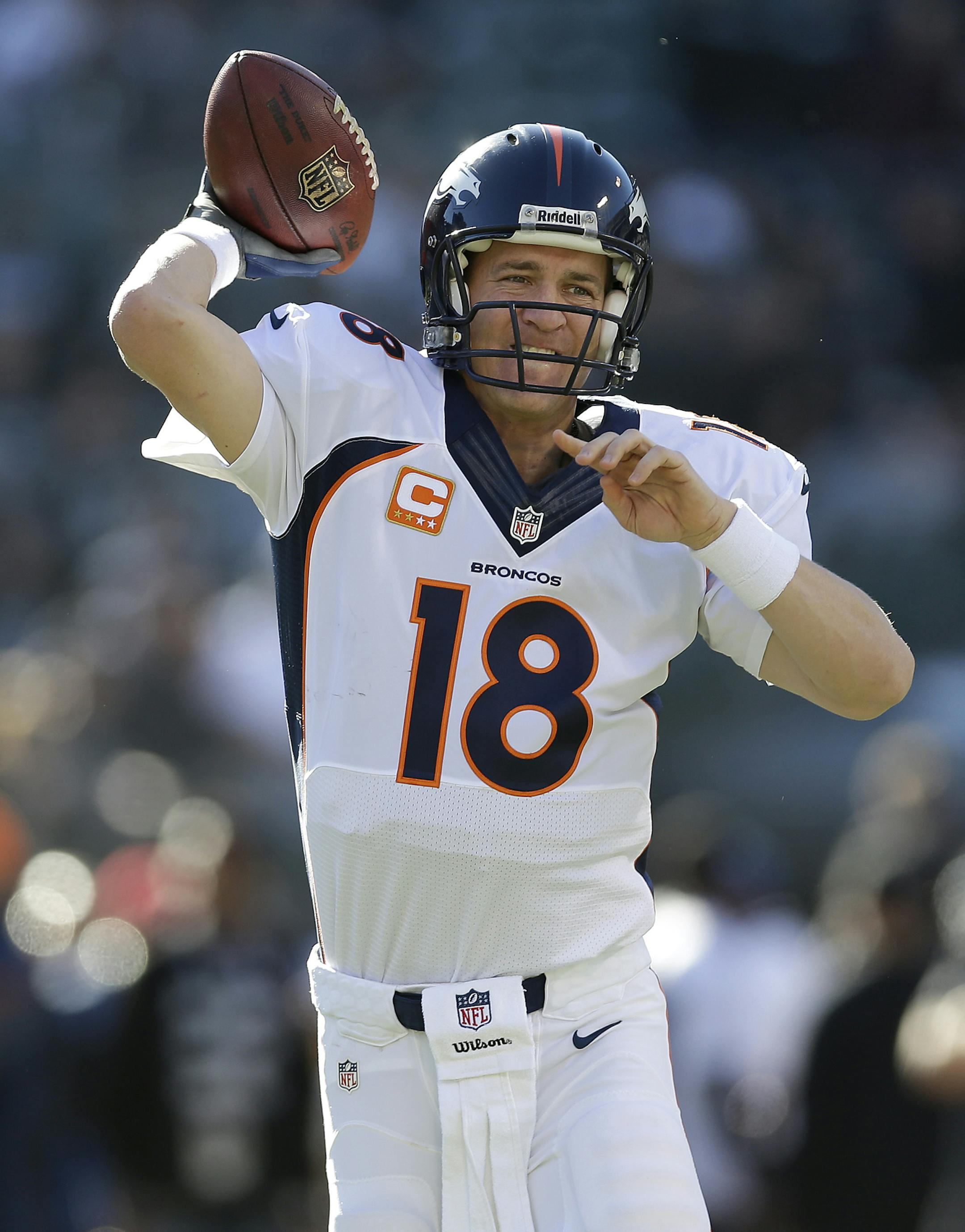 Denver Broncos quarterback Peyton Manning (18) before an NFL football game against the Oakland Raiders in Oakland, Calif., Sunday, Dec. 29, 2013. (AP Photo/Marcio Jose Sanchez) ORG XMIT: NYEOTK