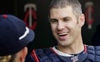 Minnesota Twins Joe Mauer was greeted by teammates after catching one pitch in the ninth inning. ] CARLOS GONZALEZ &#xef; cgonzalez@startribune.com &#