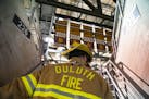 Kyle Achman climbed to the upper deck of Amsoil Arena as he prepared to participate in the stair climb in honor of the first responders who lost their
