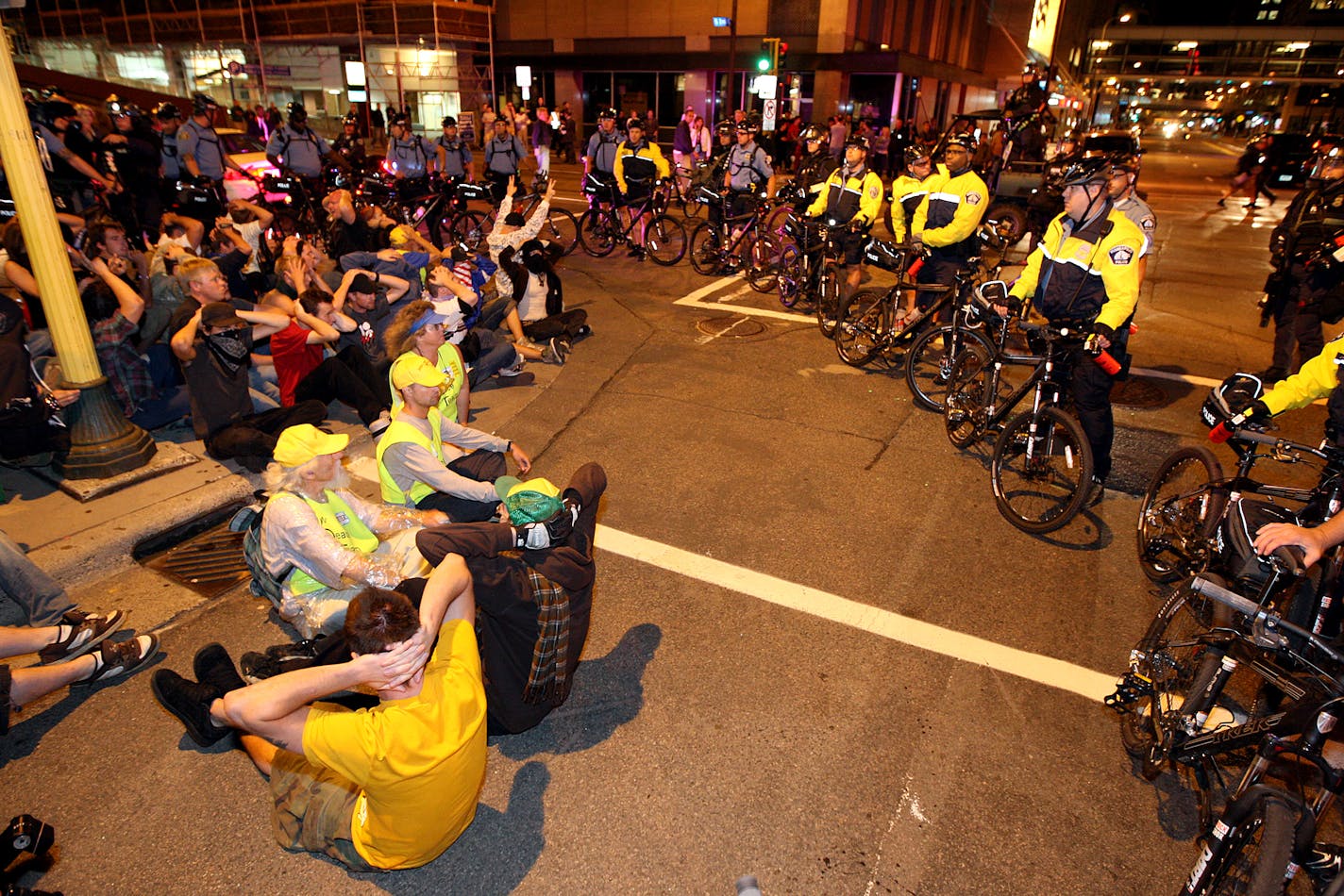 People were rounded up and arrested by police after a Rage Against the Machine concert in Minneapolis early Thursday morning (past 12am). The group rand down 7th St. between traffic and were eventually arrested.