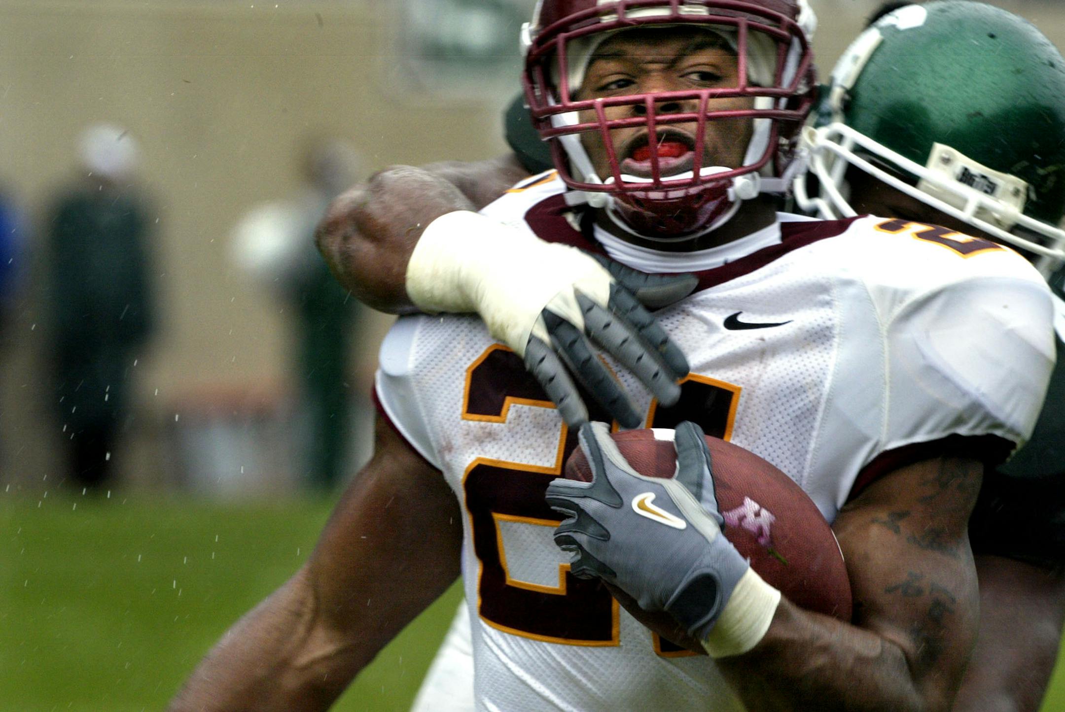 Marlin Levison - Strib 10/16/04 - Assign #89988 - UM Gophers vs. Michigan State football. Michigan State wins 51-17.