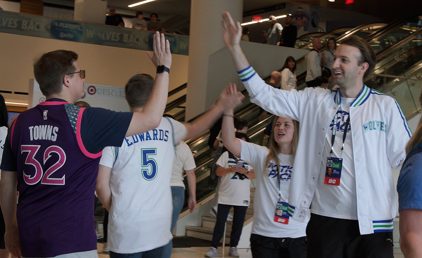 Timberwolves fans high-fived each other as they prepared to settle in for Game Six against Denver on Thursday night.