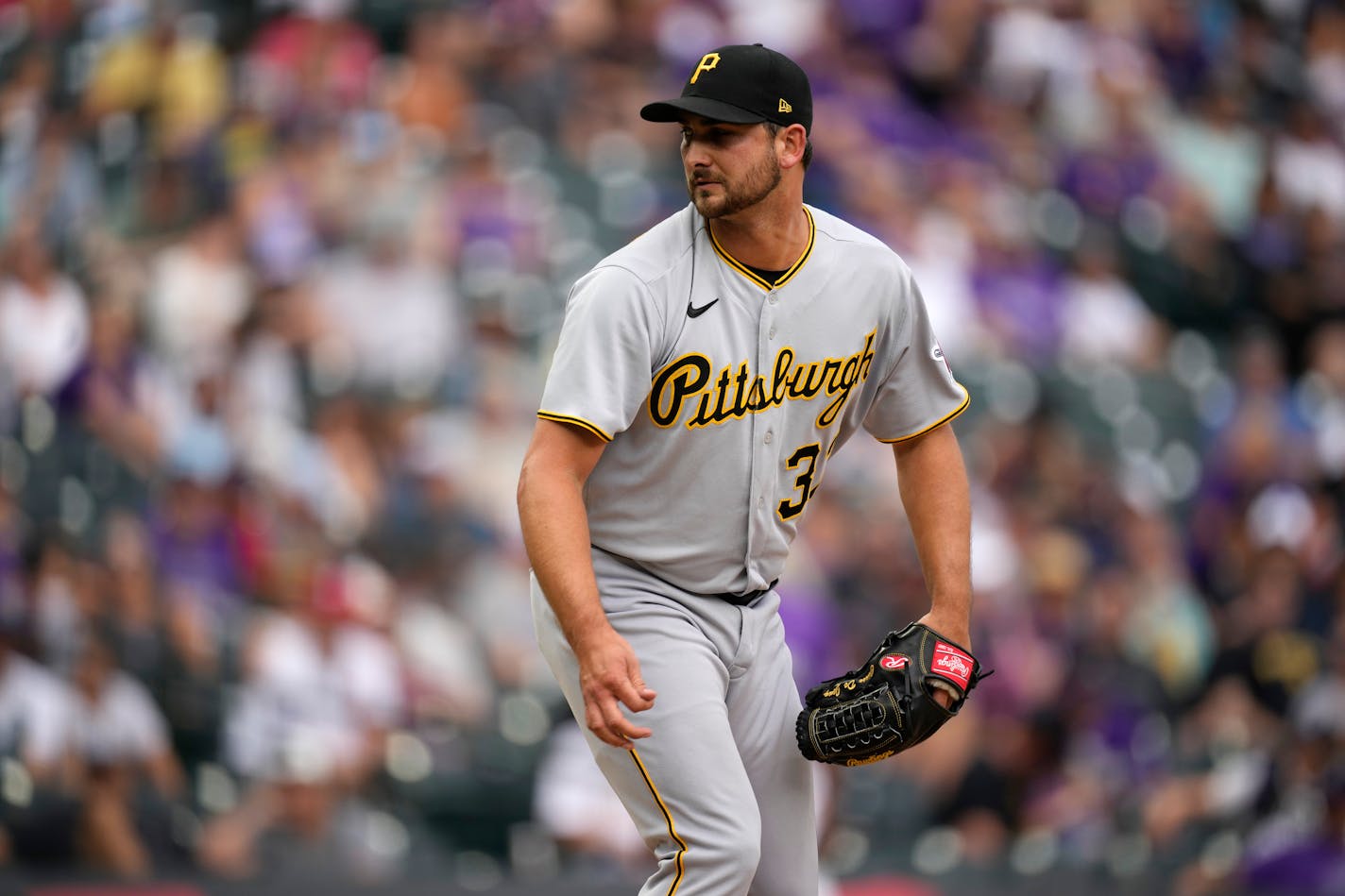 Pittsburgh Pirates relief pitcher Chase De Jong (37) during the eighth inning of a baseball game Saturday, July 16, 2022, in Denver. (AP Photo/David Zalubowski)