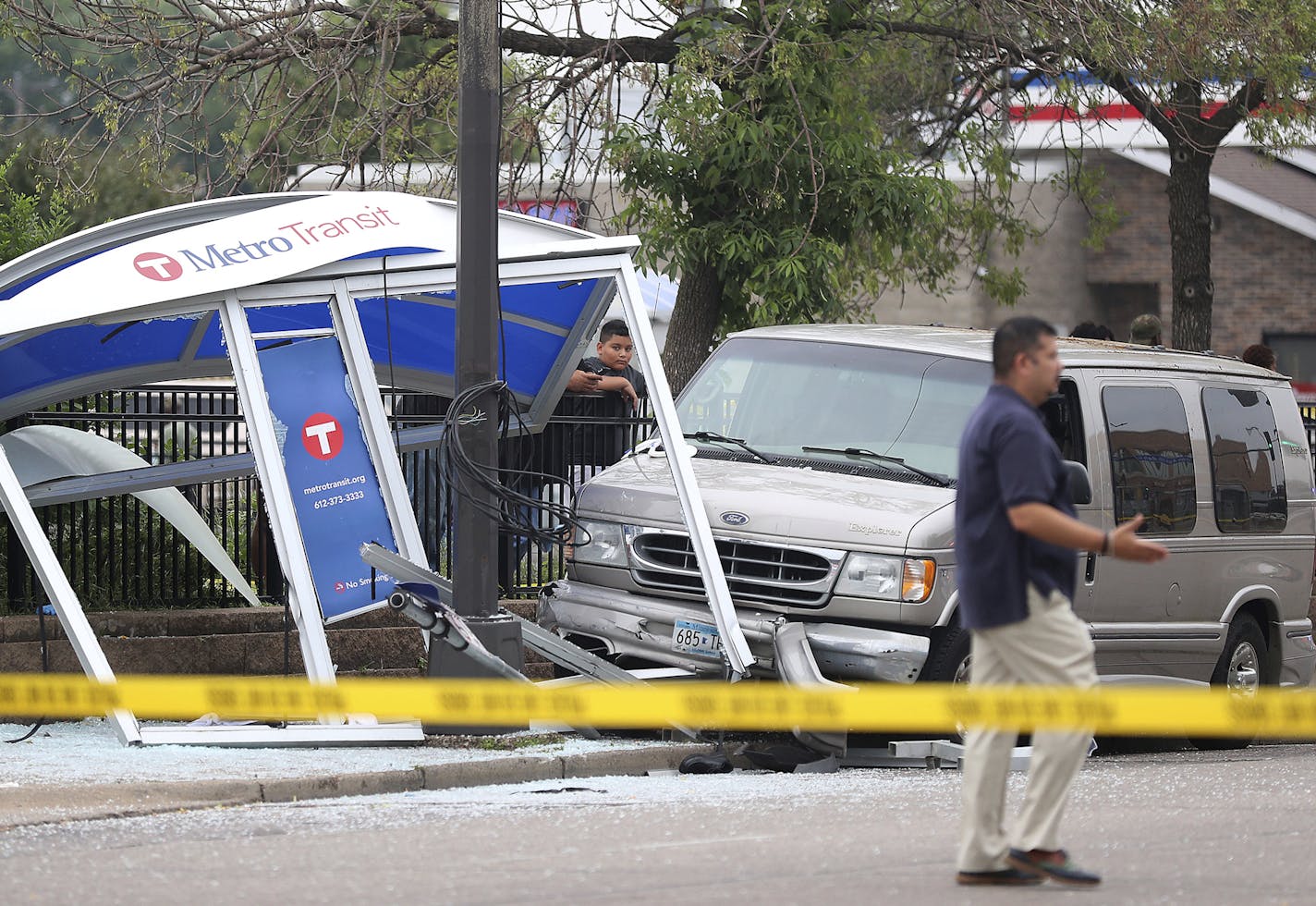 At least six people were hurt, including three critically, when a van slammed into a crowded bus stop shelter in north Minneapolis. All six were transported to hospitals.