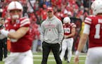 Nebraska head coach Scott Frost follows warmups before playing an NCAA college football game against Ohio State in Lincoln, Neb., Saturday, Sept. 28, 