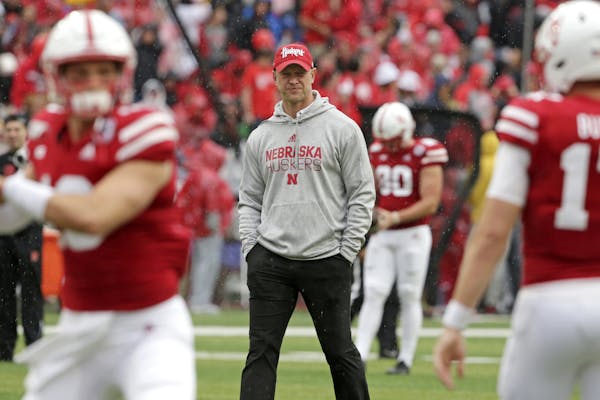 Nebraska head coach Scott Frost follows warmups before playing an NCAA college football game against Ohio State in Lincoln, Neb., Saturday, Sept. 28, 