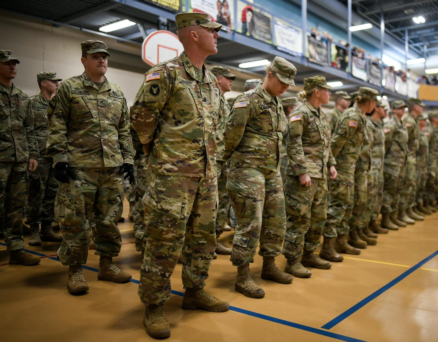 Members of the 257th Military Police Company stood in formation before being released to their families Wednesday after a nine-month deployment at Guantanamo Bay. ] AARON LAVINSKY &#xef; aaron.lavinsky@startribune.com More than 120 soldiers from the 257th Military Police Company returned home from their nine-month deployment Wednesday, Dec. 20, 2017 at the Monticello Community Center in Monticello, Minn. They were greeted by hundreds of family members and friends who were happy to welcome them h