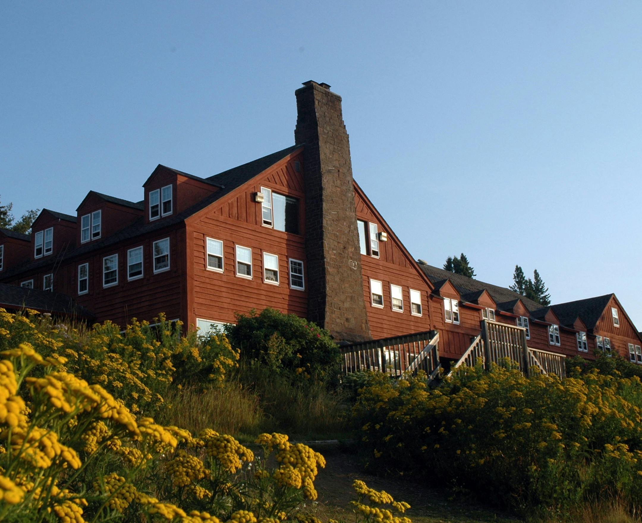 This photo taken July 6, 2010, shows the Lutsen Lodge and Resort which celebrated its 125th birthday. The iconic resort on Minnesota's North Shore is on the market for the first time in nearly three decades. The Star Tribune reports that longtime owners Nancy Burns and Scott Harrison have put the Lutsen Resort on the market for almost $10 million. (Jim Buchta/Star Tribune via AP)