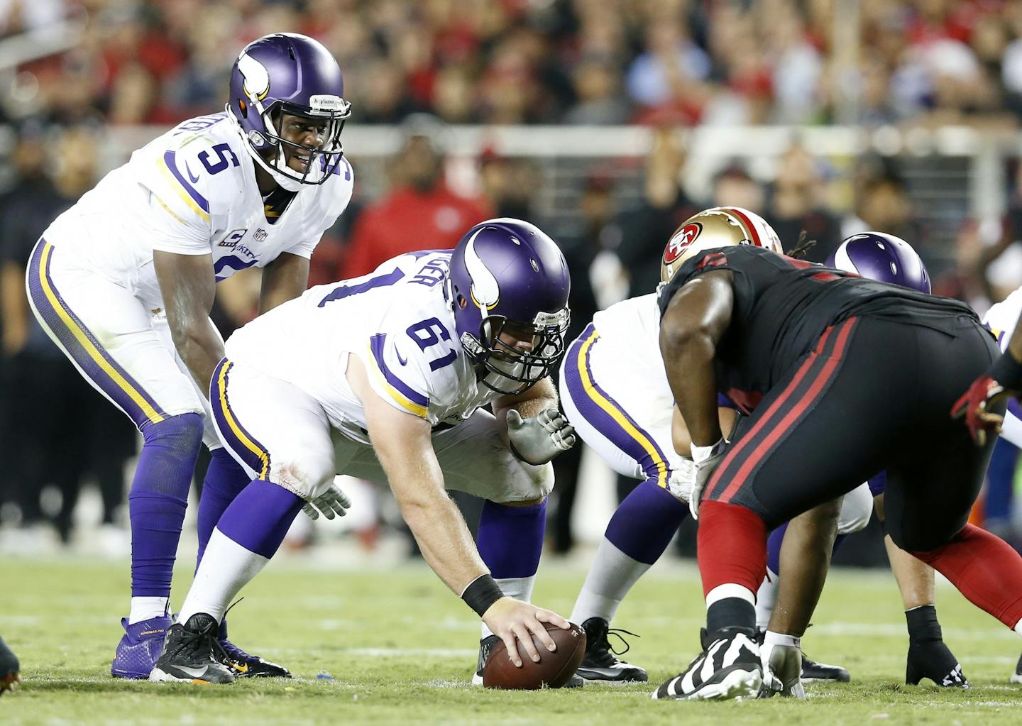 Minnesota Vikings quarterback Teddy Bridgewater (5) and center Joe Berger (61).