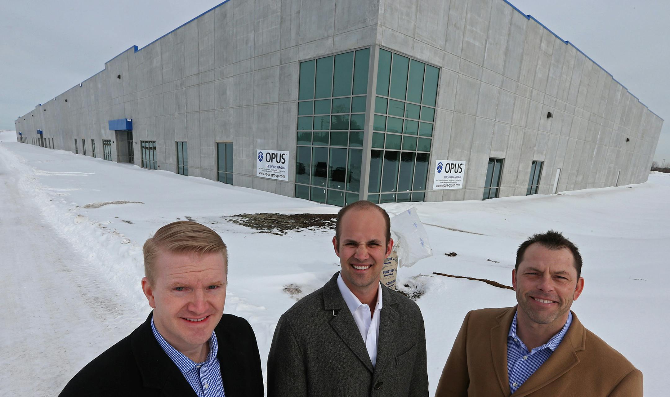 (left to right) Ryan Krzmarzick, vp Colliers International, Eric rossbach, senior associate Colliers International and Anthony Phelps, Opus,Senior Director real estate development were photographed at the valley Park Business Center in Shakopee on 2/18/14. One of biggest trends in the local CRE market is the return of speculative warehouse development. It's really getting to be big. One example is the new Valley Park Business Center out in Shakopee from Opus.] Bruce Bisping/Star Tribune bbisping