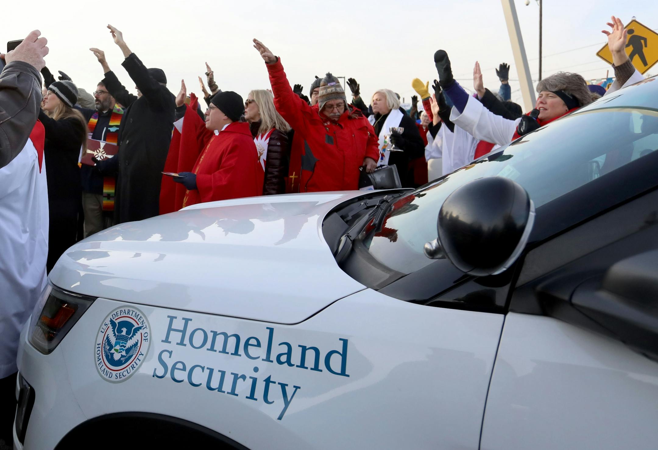 Episcopal clergy as well as clergy of other faiths offered a prayer and blessing to the detainees inside the Whipple Federal Building Tuesday, Oct. 29, 2019, in St. Paul, MN. Clergy and protestors gathered for a service and communion outside the Whipple Federal Building and to protest the naming of the building after the Episcopal bishop because deportations and other actions at the courthouse are in opposition to the beliefs of the Episcopal church, they stated.