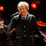 FILE - In this Jan. 12, 2012, file photo, Bob Dylan performs in Los Angeles. The music legend has quietly put concert tickets on sale for a tour in support of last year's album, "Rough and Rowdy Ways." His website bills it as a "World Wide Tour 2021-2024." (AP Photo/Chris Pizzello, File)