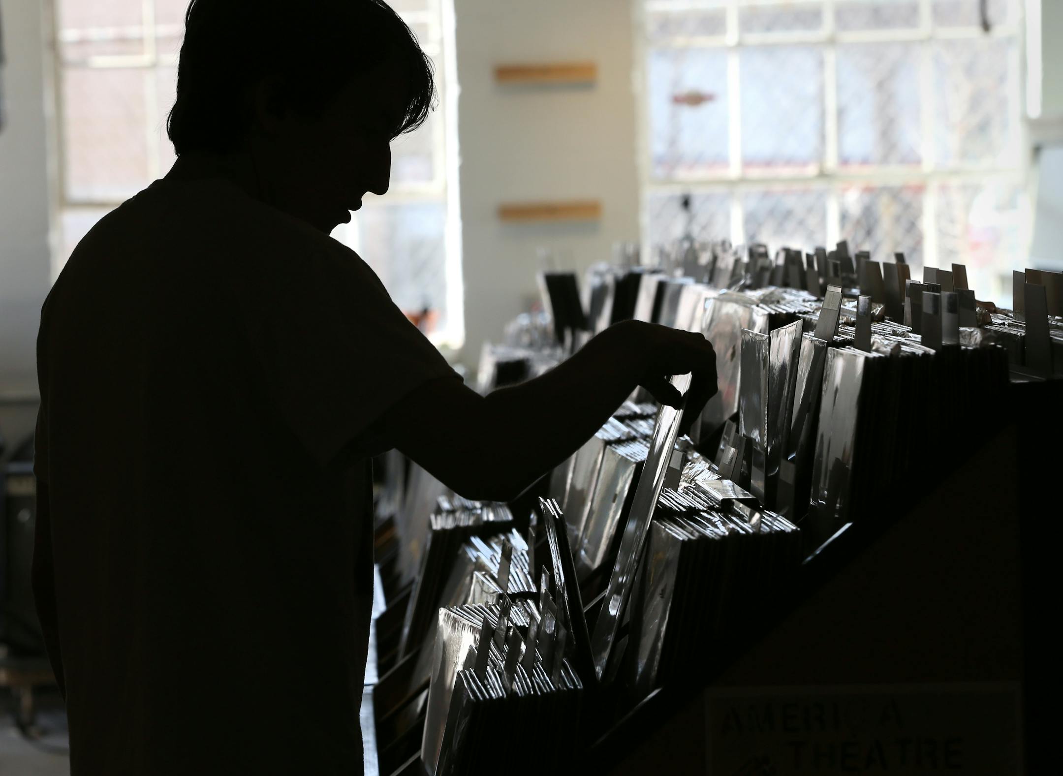 (left to right) Connie McDanzz of Minneapolis looked through the vinyl records at Barely Borthers Records in St. Paul on 4/11/14.] Bruce Bisping/Star Tribune bbisping@startribune.com Connie McDanzz/source.