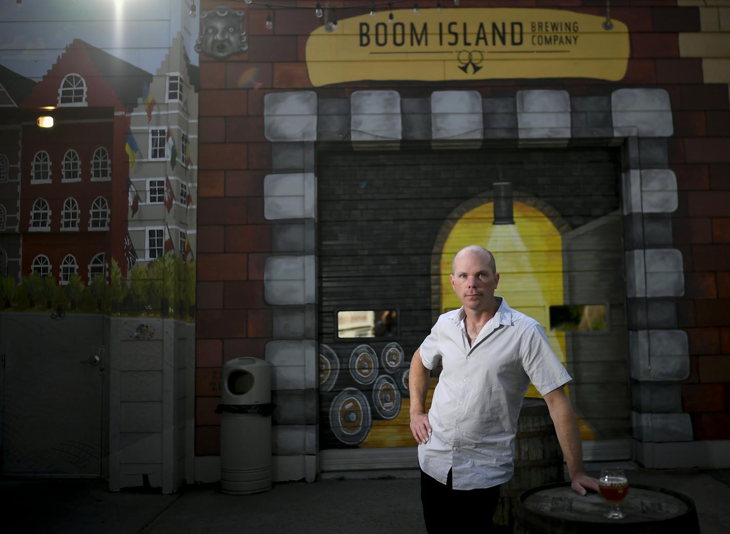 Boom Island Brewing owner Kevin Welch, shown Tuesday outside the brewery and taproom, said Friday's shooting was the last straw.