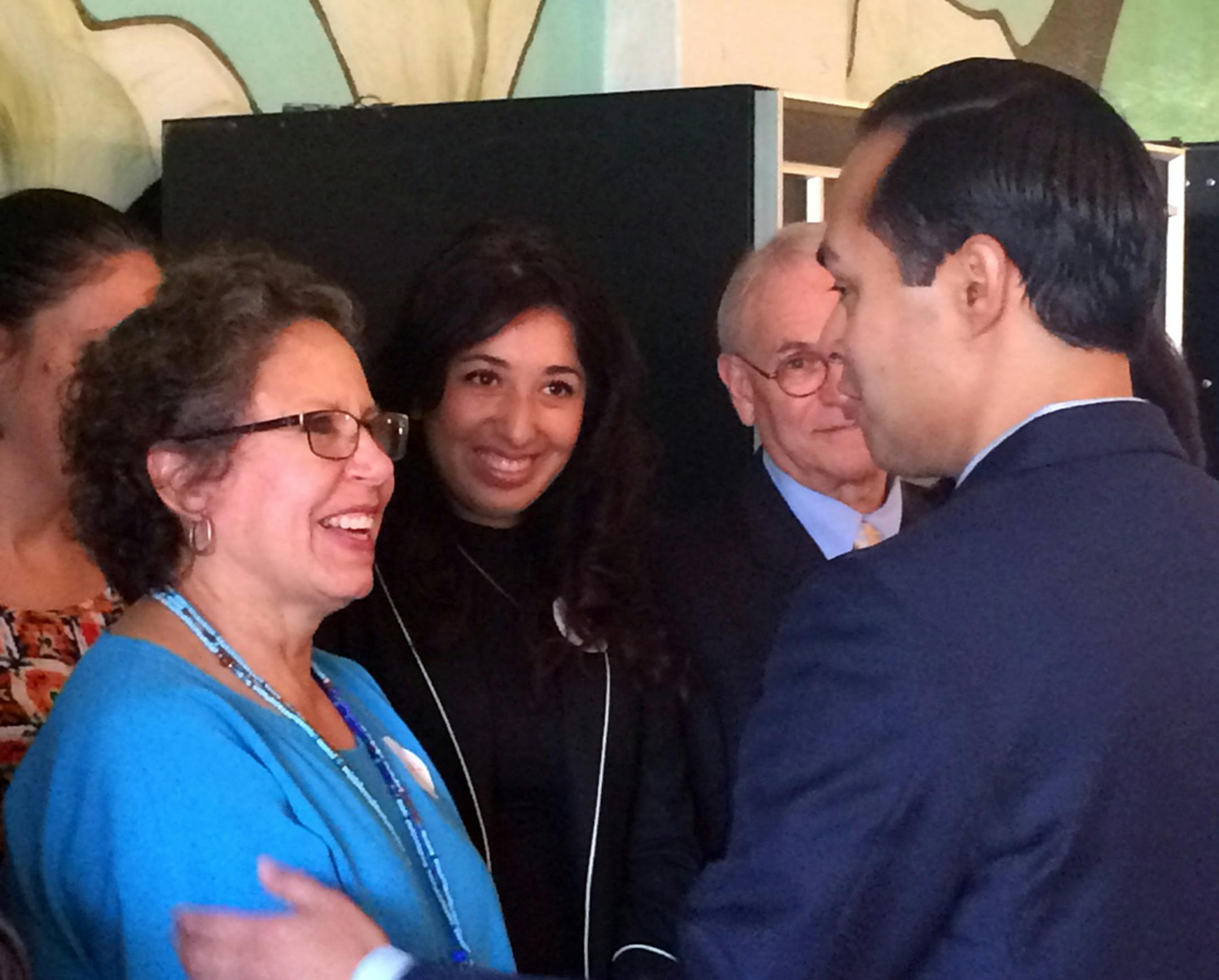 HUD Secretary Julian Castro greets Latino voters in south Minneapolis on Wednesday, Aug. 26, 2015.