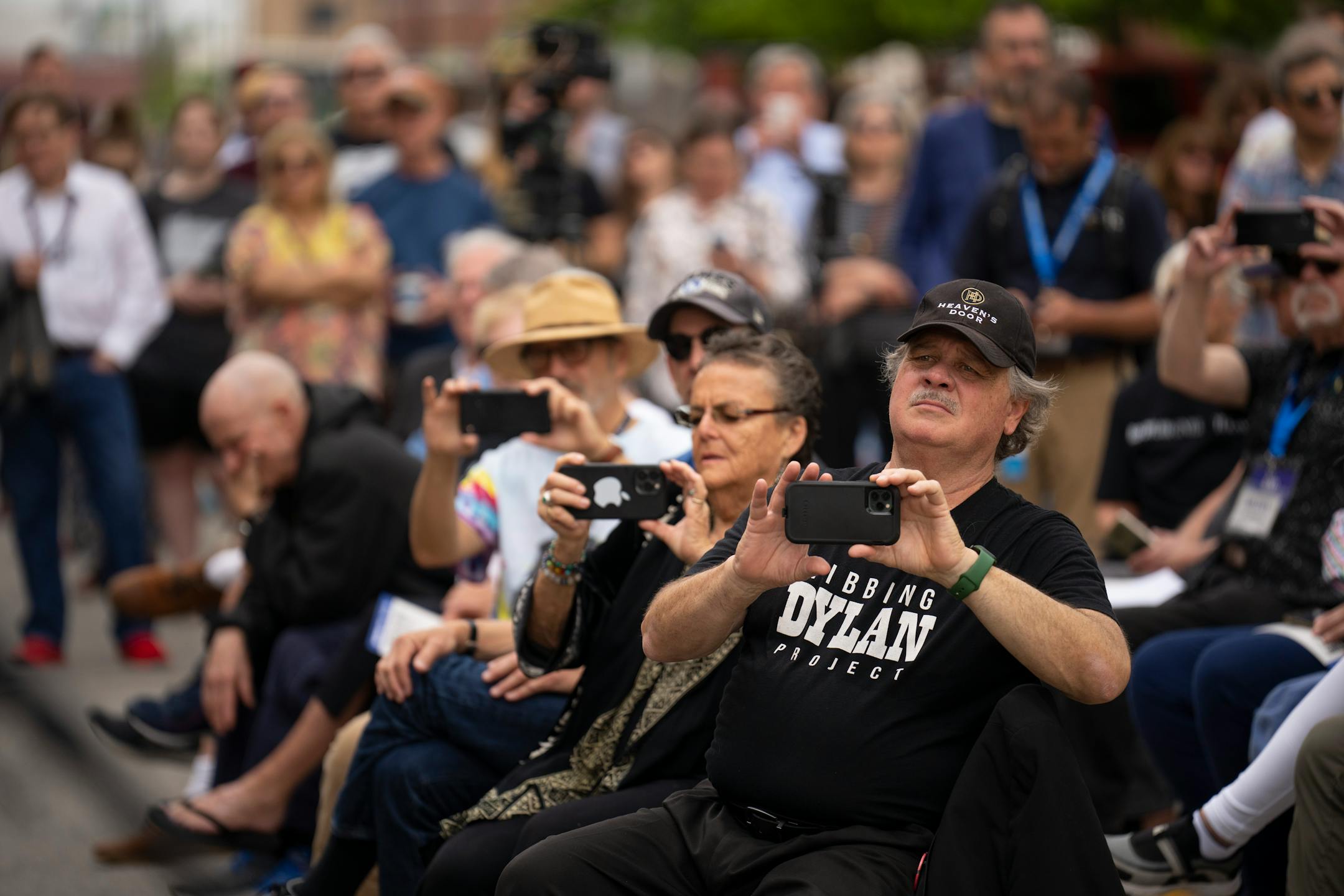 The crowd of 250 or so attending the opening ceremony for the Bob Dylan Center in Tulsa, Okla. included Nelson French of Silver Bay, Minn. on Tuesday, May 10, 2022.