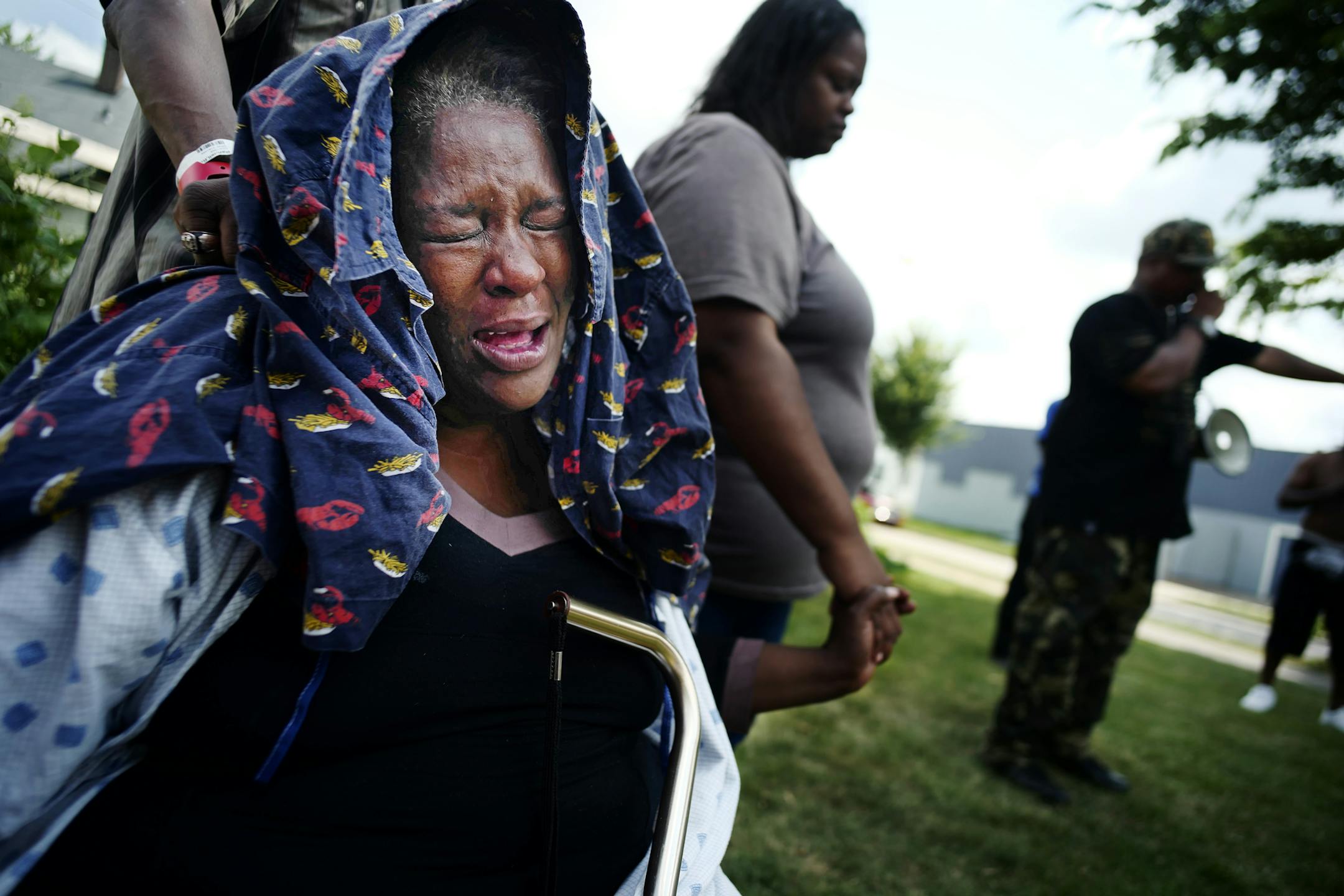 The mother of Toby's Paskins grieved for her son at a vigil at 25th and Penn Ave. North] bicyclist Tobyis Paskins was shot and killed Wednesday in north Minneapolis near 26th St. and Logan Ave N.Richard Tsong-taatarii@startribune.com