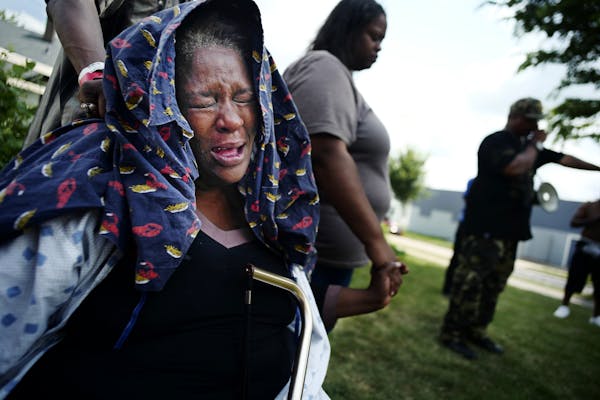 The mother of Toby's Paskins grieved for her son at a vigil at 25th and Penn Ave. North] bicyclist Tobyis Paskins was shot and killed Wednesday in nor