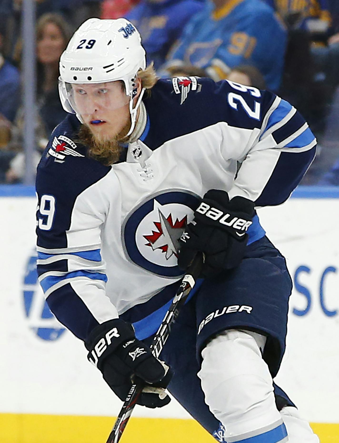 Winnipeg Jets' Patrik Laine, of Finland, skates with the puck during the first period of an NHL hockey game against the St. Louis Blues, Friday, Feb. 23, 2018, in St. Louis. (AP Photo/Billy Hurst)