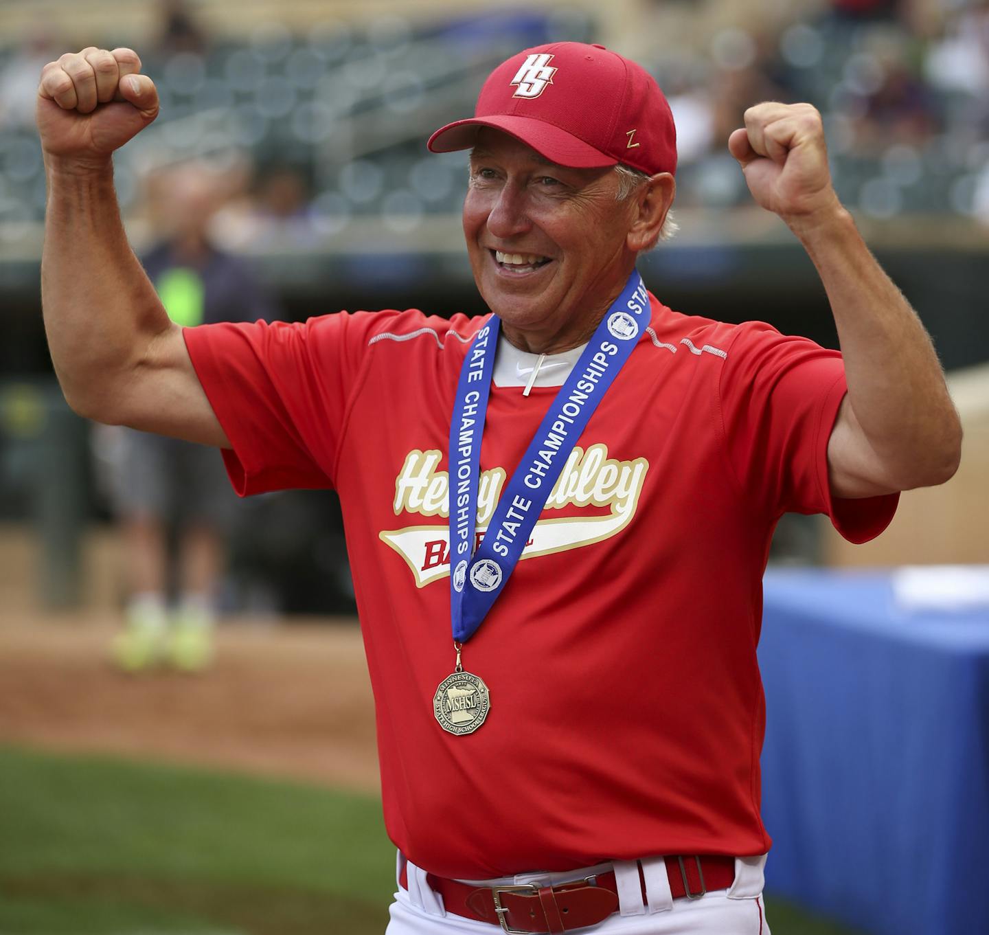 Henry Sibley head coach Greg Fehrman headed back towards his players after he received the last championship medal. ] JEFF WHEELER &#x2022; jeff.wheeler@startribune.com Henry Sibley defeated Mahtomedi 8-4 to win the Class 3A Minnesota State High School League baseball tournament championship game Monday afternoon, June 20, 2016 at Target Field in Minneapolis.