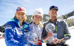 FILE -- Mikaela Shiffrin, center, with her parents Eileen and Jeff at the Audi FIS Ski World Championship in Aspen, Colo, March 19, 2017. A personal l