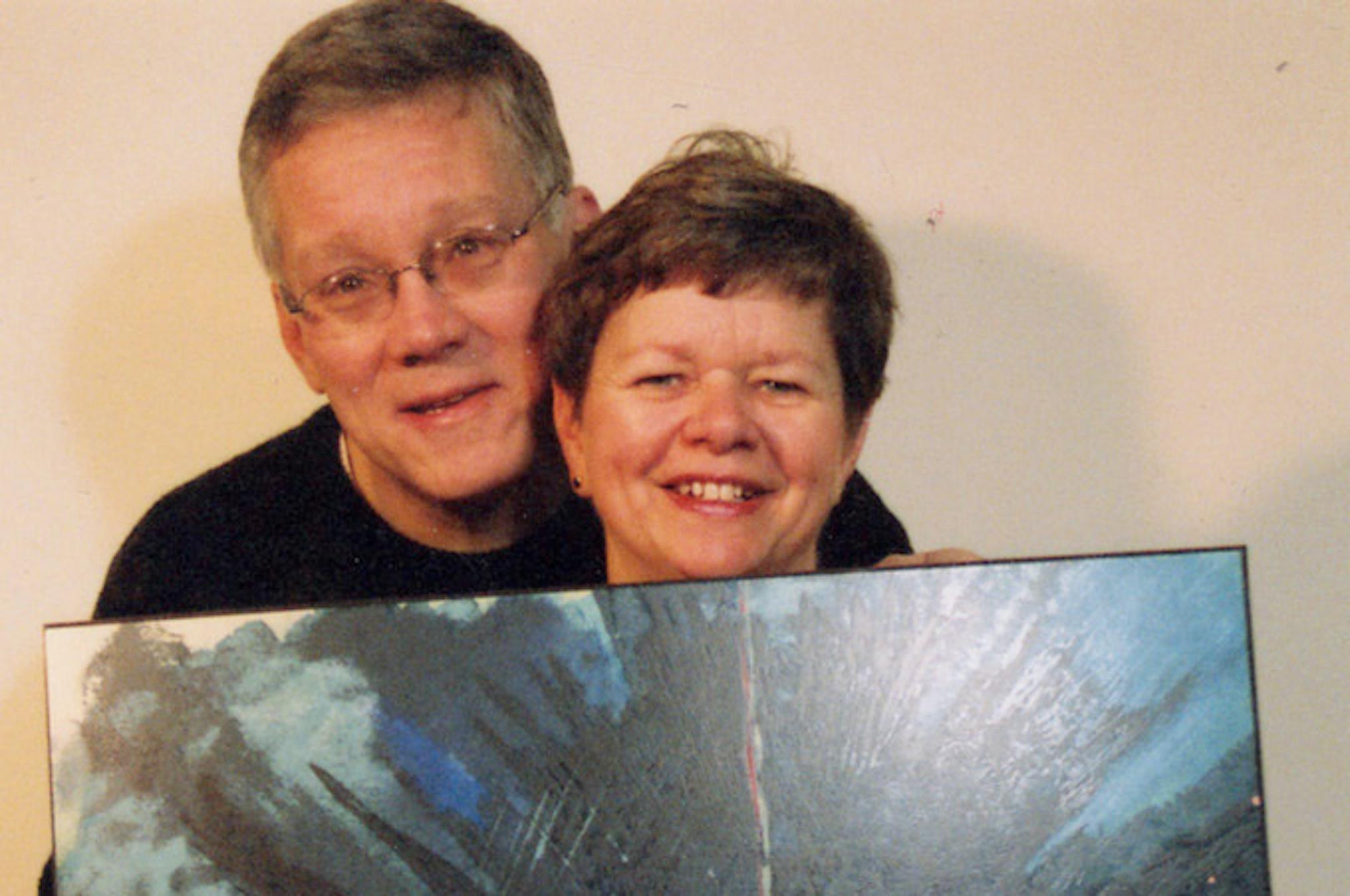 Steve and Jean Danko display a piece of art by the late Theodor Geisel, better known as Dr. Seuss. They are local agents for the Seuss art, which has helped their downtown Minneapolis art gallery survive while many others have failed in recent years.