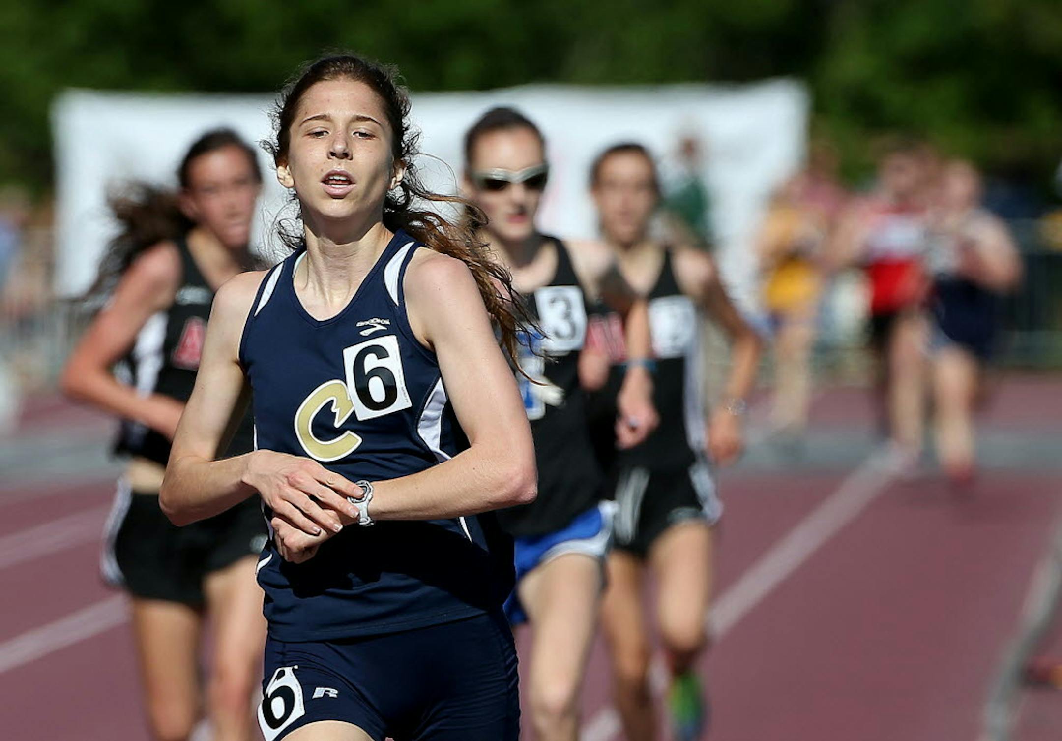 Chanhassen's Emily Castanias crossed the finish line to win the 3200-meter run final with a time of 10:28:58 at the Class 2A girls' state track and field meet Friday at Hamline University.