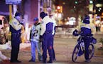 An inebriated Patriots fan is helped by Minneapolis Police officers to find his friends.
