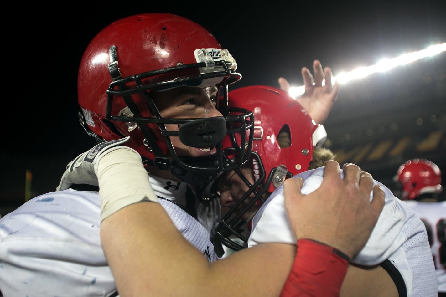 Eden Prairie linebacker Carter Coughlin, left, celebrated the Eagles' Prep Bowl victory over Totino-Grace in November.