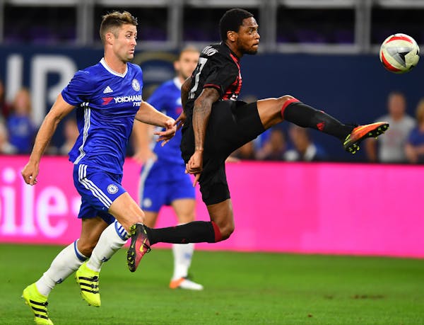 AC Milan forward Luiz Adriano tried to control the ball while attacking Chelsea's goal in the second half. ] (AARON LAVINSKY/STAR TRIBUNE) aaron.lavin
