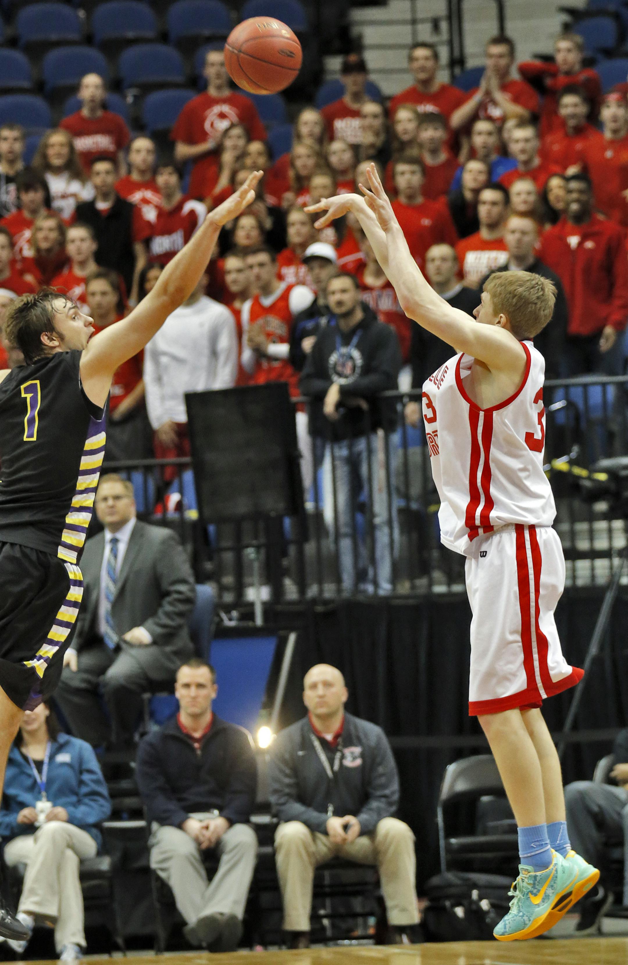 Panthers J. P. Macura hit a three-point shot with time running out in regulatiion play, then celebrated with teammates. Final score Lakeville North 55 - Cretin-Derham Hall 52. ] Class 4A Boys Basketball Tournament. Macura shot over the defense of Raiders Sam Neumann (1). Lakeville North Panthers vs. Cretin Derham Hall Raiders.(MARLIN LEVISON/STARTRIBUNE(mlevison@startribune.com)