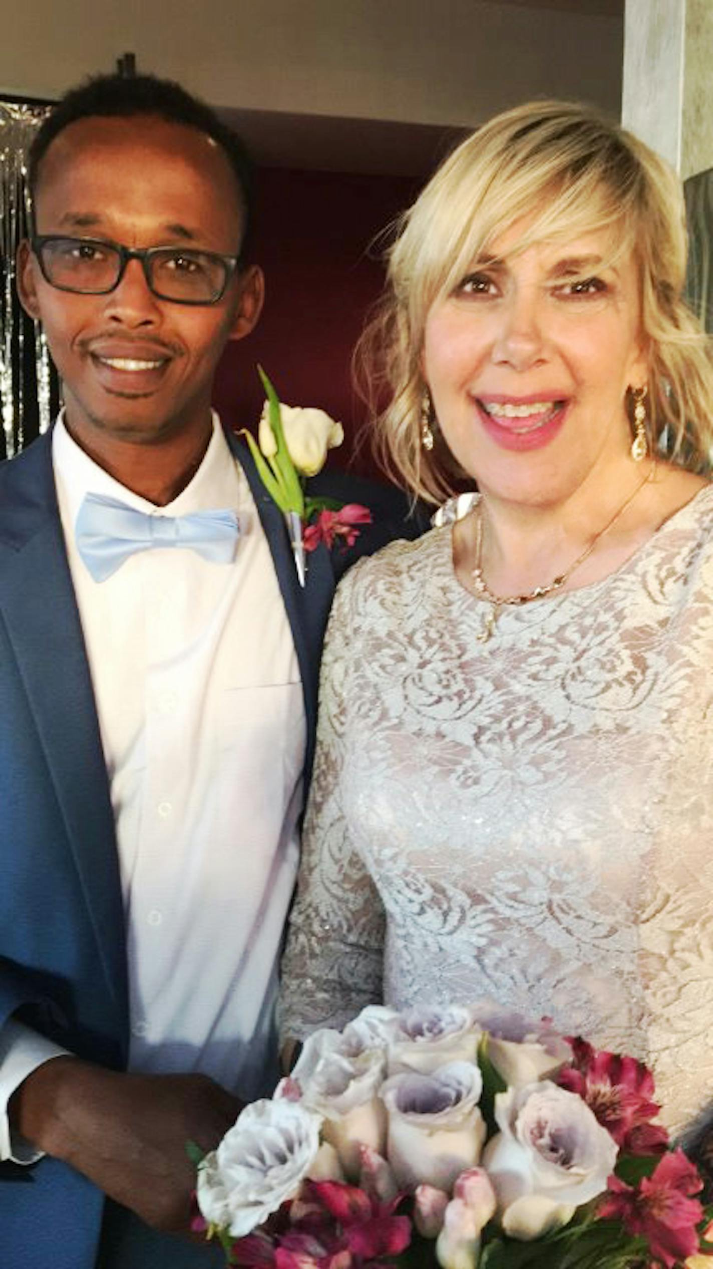 Abdulkadir Sharif Abdi, who faces deportation to Somalia, and Rhoda Christenson on their wedding day in 2017.