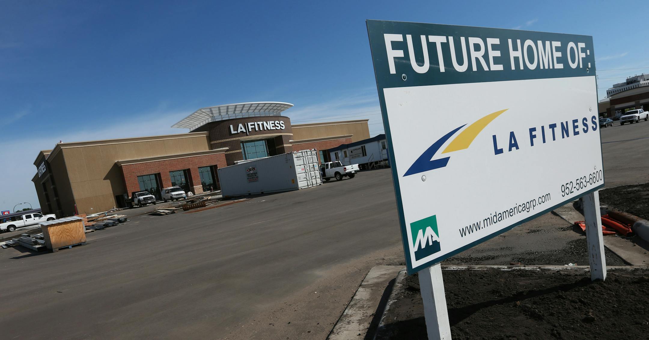 Its taken longer than expected, but $100 million Shingle Creek Crossing, anchored by a big Wal-Mart store, is gaining momentum as four outlot buildings are leased and three of them are nearing completion along with an LA Fitness expected to open in late August, Brooklyn Center officials said. Photographed on 8/2/13.] Bruce Bisping/Star Tribune bbisping@startribune.com