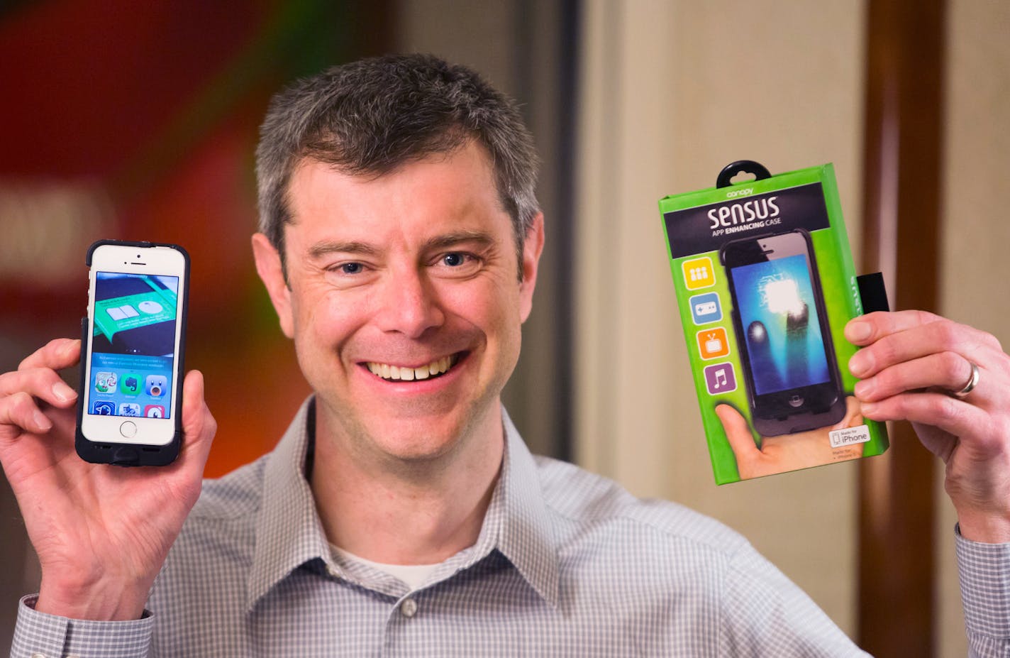 Andrew Kamin-Lyndgaard, CEO of Canopy, holding the pressure-sensitive Sensus case for the iPhone. photo: Canopy