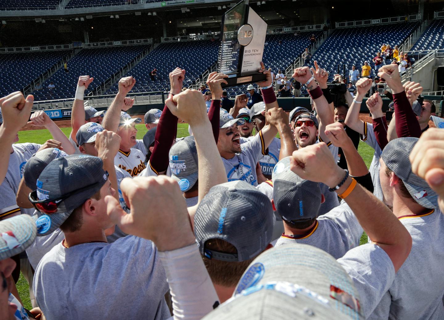 The Gophers baseball team celebrated with the Big Ten trophy following their 6-4 victory over Purdue in Omaha, Neb., on Sunday. Minnesota (41-13) will face Canisius (35-20) at Siebert Field at 7 p.m. on Friday in an NCAA regional.