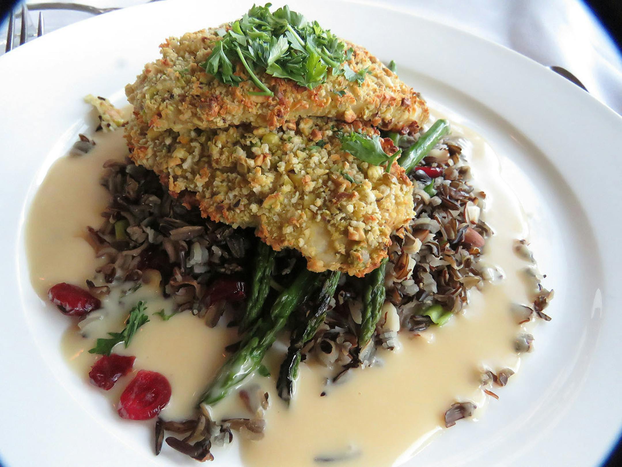 Walleye ranks as an almost mandatory Minnesota dinner, and The Dining Room at Madden Lodge serves it elegantly crusted with pistachios over wild rice.