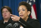 Attorney General Loretta Lynch gestures during a news conference at the Justice Department in Washington, Wednesday, May 20, 2015, to announce that fo