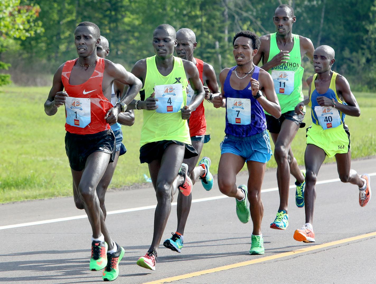 T06.18.2016 -- Steve Kuchera -- kucheraRACE0619c15 -- The front-running men near the Talmadge River during Grandma�s Marathon Saturday. Steve Kuchera / skuchera@duluthnews.com