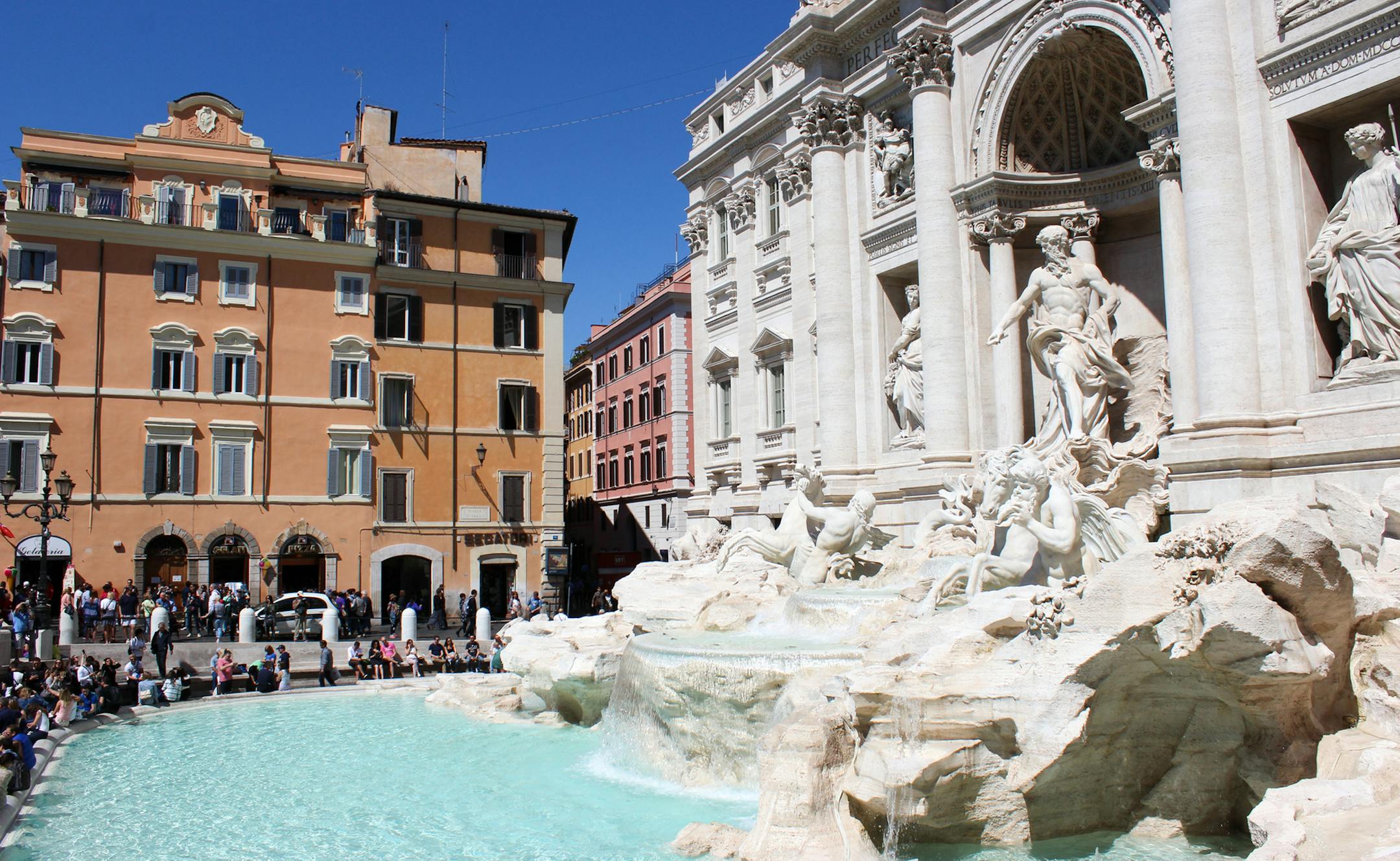 The newly-restored Trevi Fountain in Rome draws thousands of tourists. (Ellen Creager/Detroit Free Press/TNS) ORG XMIT: 1185815