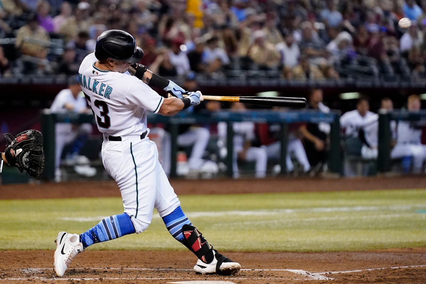 Arizona Diamondbacks' Christian Walker connects for a home run, his second of the baseball game, against the Minnesota Twins during the fourth inning Sunday, June 19, 2022, in Phoenix. (AP Photo/Ross D. Franklin)