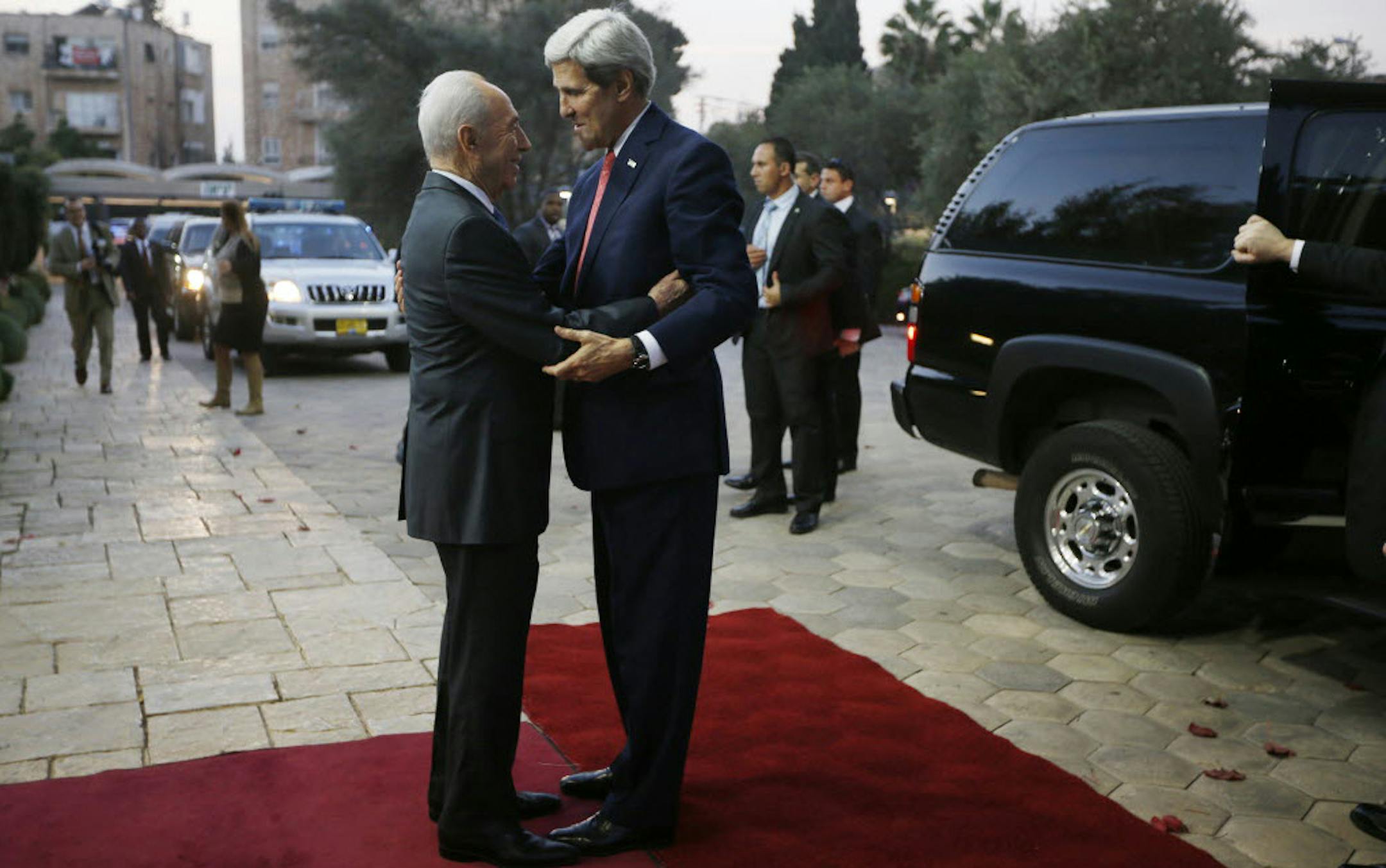 Israeli Prime Minister Shimon Peres greeted Secretary of State John Kerry in Jerusalem. Kerry will next visit Jordan, the UAE, Algeria and Morocco.