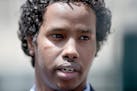 Mohamed Ali Omar speaks outside the federal courthouse, Tuesday, June 9, 2015, in Minneapolis. Omar, convicted of threatening FBI agents who were cond