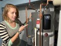Jenny Hoops just switched out the old gas water heater in her St. Paul Midway home for a new electric heat pump water heater by Rheem. She’s plannin