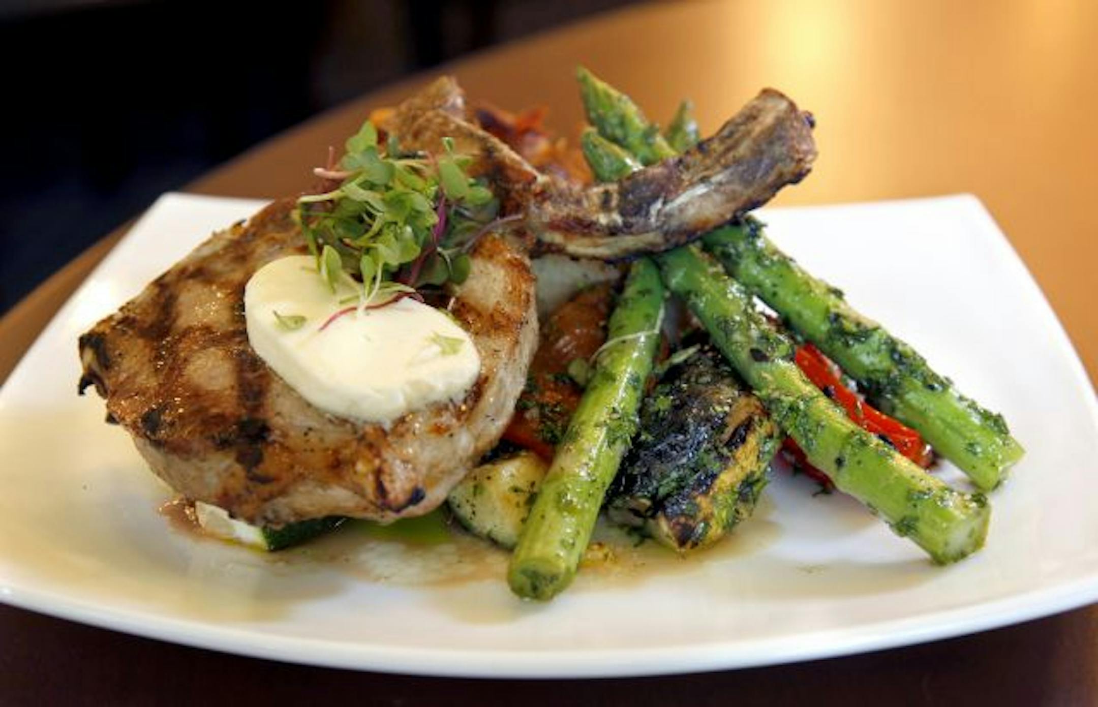 A thick-cut, apple-cider brined pork chop, served in glorious surroundings at Forum.