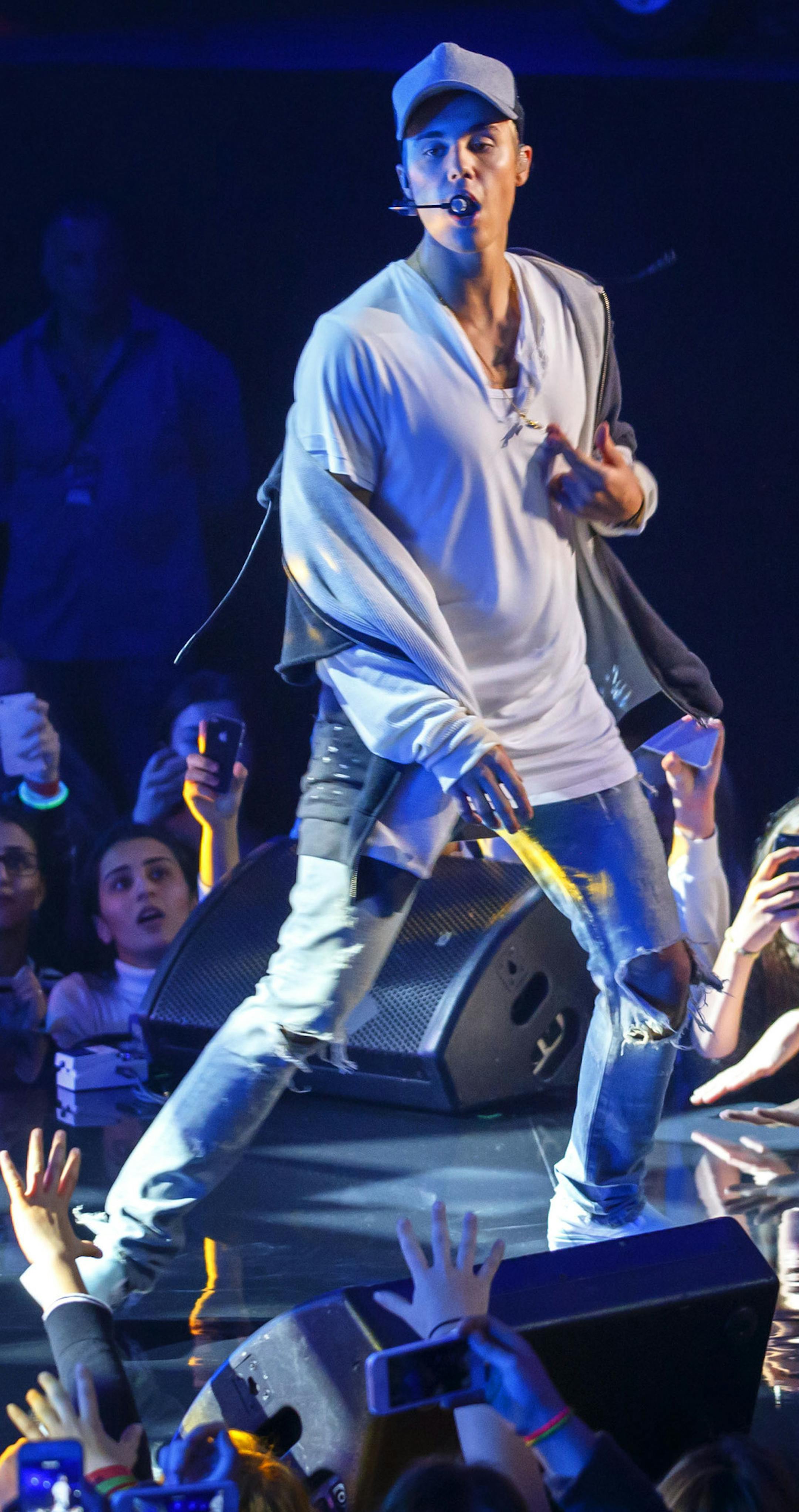 Singer Justin Bieber on stage during a concert in Oslo, Thursday Oct. 29, 2015. Bieber says he stopped a concert in Oslo after one song Thursday because fans got in his way as he tried to wipe up liquid on stage. On Instagram, he wrote that he "chose to end the show as the people in the front row would not listen."(Heiko Junge, NTB scanpix via AP) NORWAY OUT