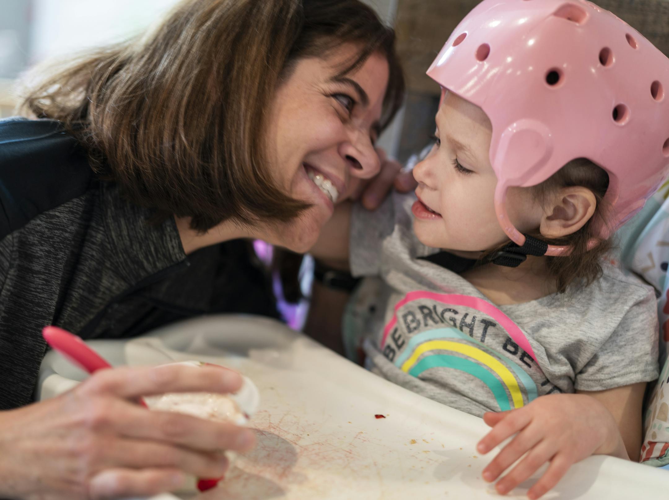 Hazel Norris, 3, shares a moment during snack time with her at home nurse Rachael Hatcher ] LEILA NAVIDI ¥ leila.navidi@startribune.com BACKGROUND INFORMATION: Hazel Norris, 3, with her at home nurse Rachael Hatcher in Otsego on Wednesday, May 1, 2019. Three-year-old Hazel Norris has intractable epilepsy. She needs around-the-clock monitoring to care for her frequent seizures, a level of medical care that overwhelmed her parents alone. But Hazel has a team of in-home nurses, who not only pr