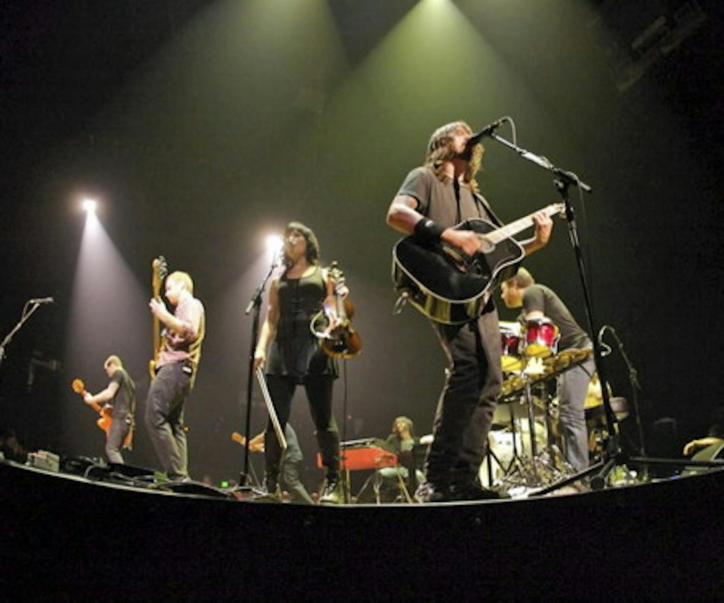 Violinist Jessy Greene, center, appears in the new Foo Fighters documentary. / Photo by Jack Butler